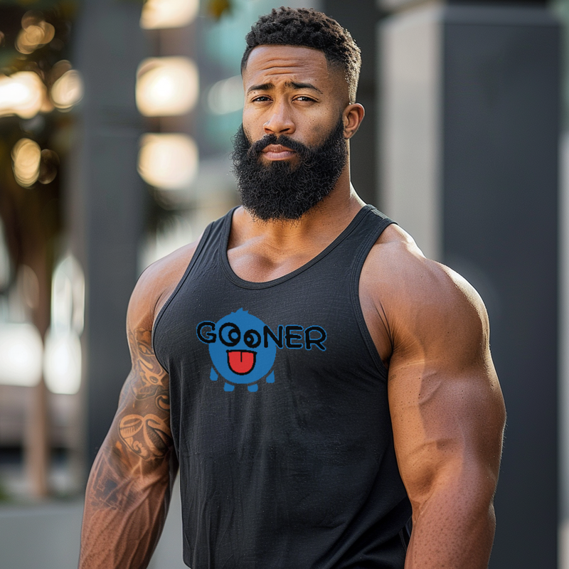 Man wearing a black tank top with a logo, standing outdoors.