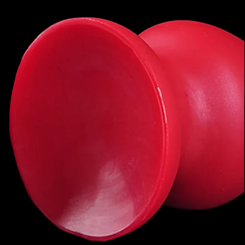 Red suction cups with text indicating their use on various surfaces.