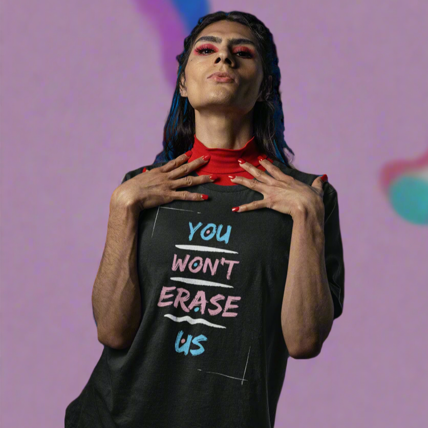 Person wearing a black sleeveless shirt with colorful text design on a white background
